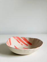 bowl in coral pour